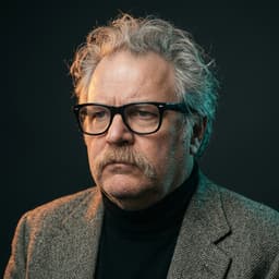 Dino — fictional senior art director from The Seam (AI-generated portrait)